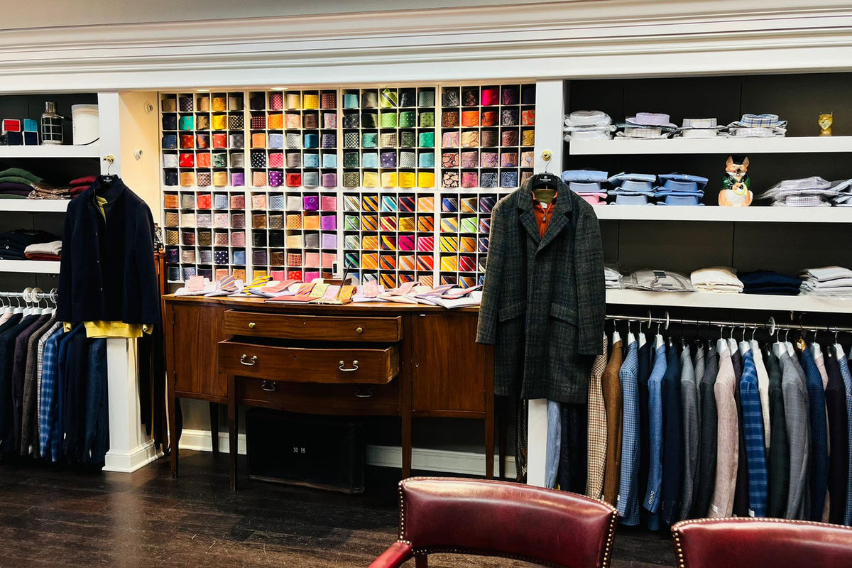 Inside Wm. Fox, with tailored jackets, shirts and ties on display