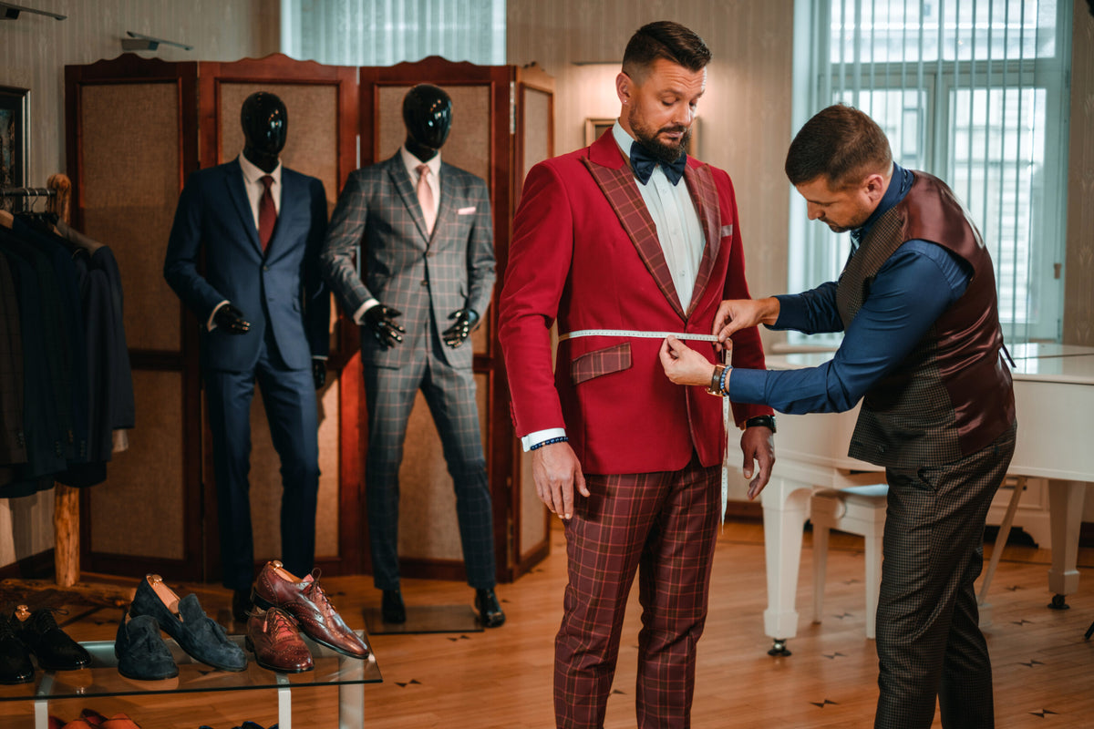 elegant-man-being-fitted-for-custom-tailored-suit-2026-01-05-04-55-04-utc-scaled.jpg